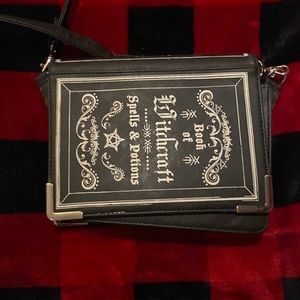 Book of Witchcraft cross body bag